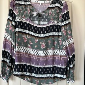 Maurice’s lightweight long slv blouse. Sweet cleavage tie. Size Med colorful.